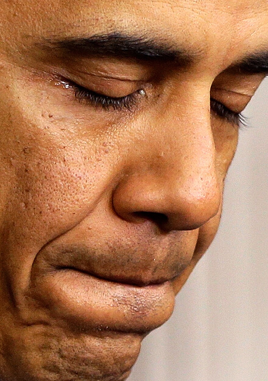 President Obama pauses as he speaks at the White House about Friday's school shooting in Newtown, Conn.