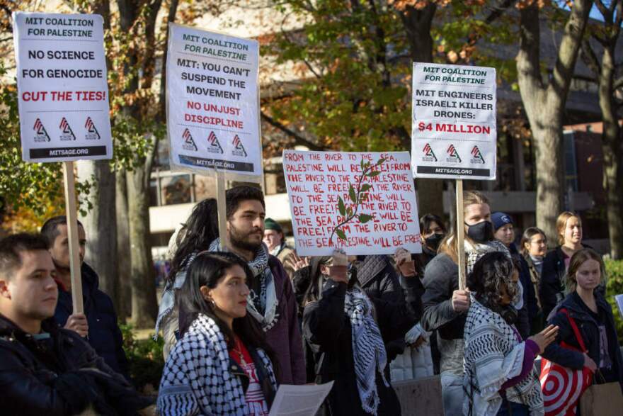 Protest placards at a student rally on Massachusetts Ave. at MIT. (Robin Lubbock/WBUR)