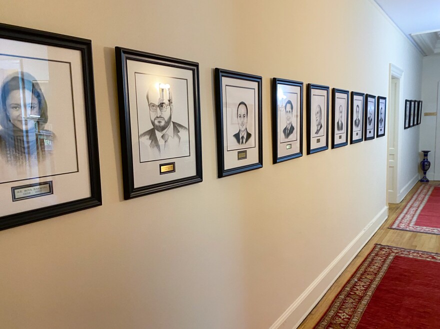 In a long hallway at the Afghan embassy, a dozen portraits of former ambassadors line the walls in order of the years they served. The portraits skip the years between 1981 and 2002, a gap that includes the previous time the Taliban was in power.