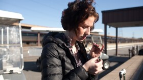 Eden is a prostitute who was recently arrested and is awaiting a court hearing. Here, she waits outside the Richmond, Va., train station for her mother to pick her up.