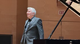 Jean Yves Thibeaudet taking his bows after an all-Debussy recital at Harris Hall.
