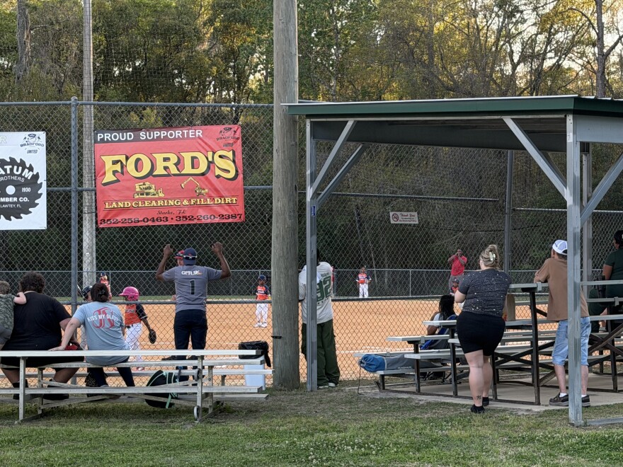 Parents and family members gather at Edwards Road Complex for a T-ball game. Tuesday and Wednesday marked the first day of regular season games for the spring recreational season. (Kevin Perez/WUFT News)