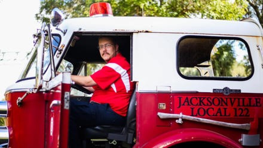 Brian Kernohan poses for a photo outside of Local 122 of the Jacksonville Association of Firefighters.