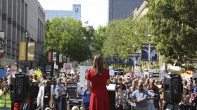 Democratic Associate Justice Allison Riggs stands before more than a hundred supporters at her rally in Raleigh, N.C., on Monday, April 14, 2025. (AP Photo/Makiya Seminera)