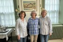 Harriet Davenport, Pam Walton and Val Starbuck of the Chesterfield Historical Society stand in the ladies room at the Stone House Tavern Museum.