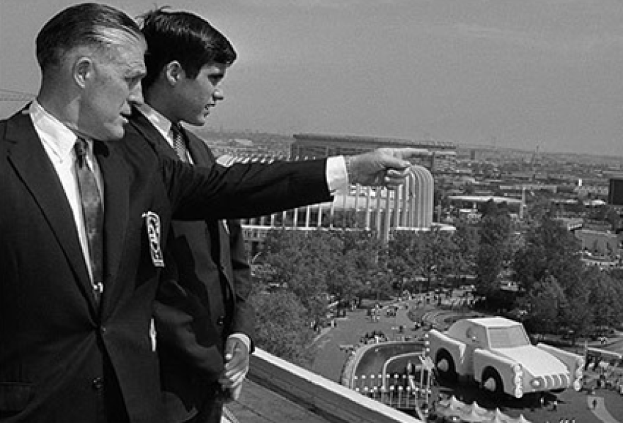 George W. Romney with son, Mitt, overlooking the Chrysler exhibit at the New York World's Fair grounds on May 18, 1964.