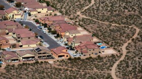 While some sections of Arizona's housing market have shown signs of recovery, potential homebuyers who are looking for affordable houses have been frustrated. This file photo from 2008 shows a subdivision extending into desert scrubland.