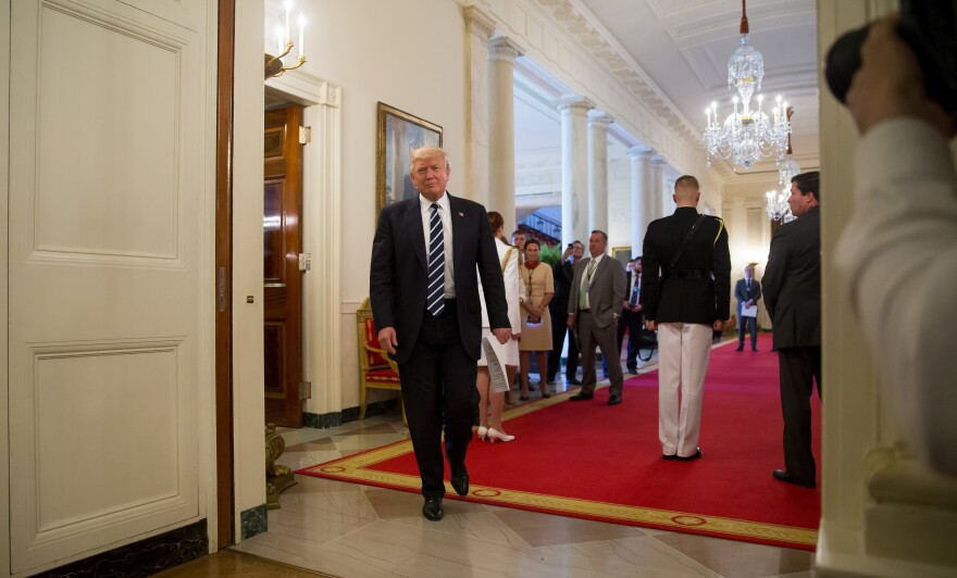 President Trump attends an Infrastructure Summit with U.S. governors and mayors in the White House on Thursday, the same day fired FBI Director James Comey testified on Capitol Hill.