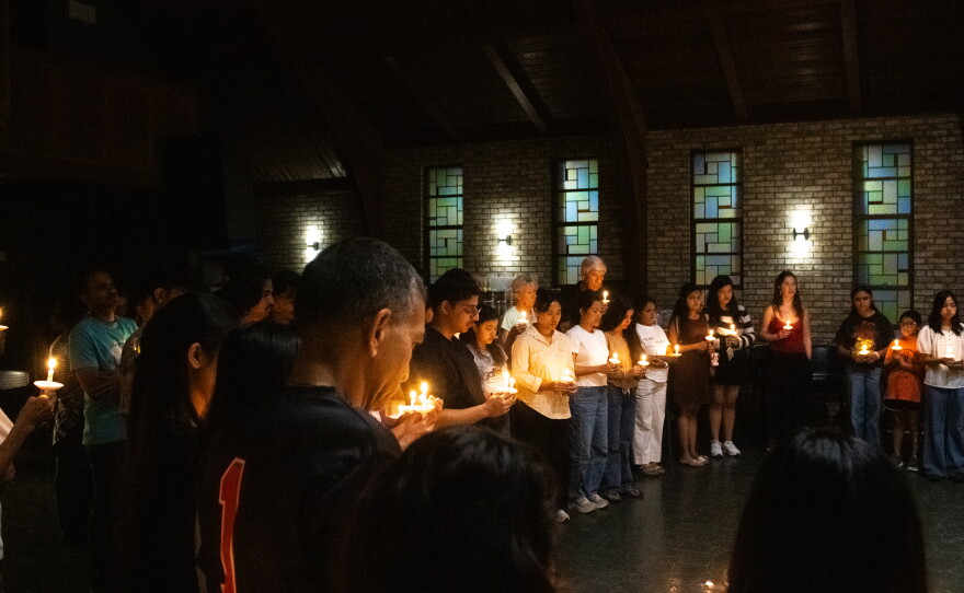Attendees of the candlelight vigil, held at Hope Lutheran Ministries in Cape Girardeau, Mo., Wednesday, Sept. 9, 2026, all came together in prayer for the victims of the Aug. 26 Nepal floods.