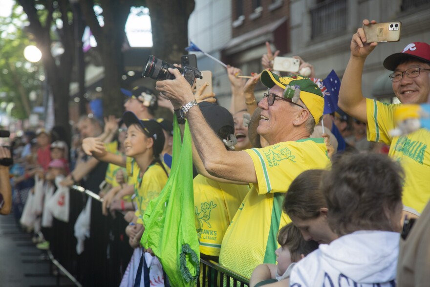 Australian fans take photos of the team during the Little League World Series parade.