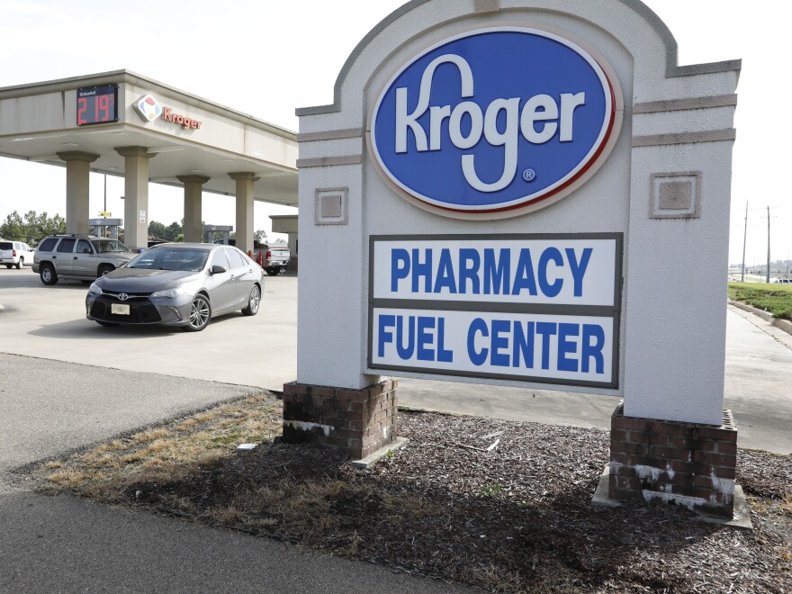 A customer exits a Kroger gas station in Flowood, Miss.