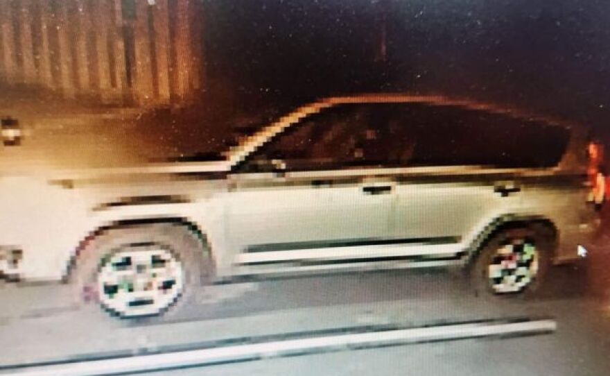 Police in western North Carolina are looking for a suspect after he was seen waving a flag with a swastika before hanging it on a synagogue's sign.