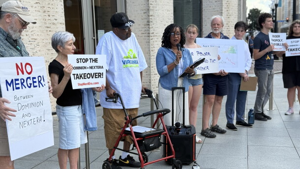 Community advocate Kim Sudderth speaks to the crowd gathered outside Norfolk's Slover library before an event with Lt. Gov. Ghazala Hashmi and local representatives Sept. 8, 2026.