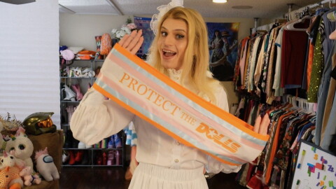 Gertsen shows off her Tennessee Doll themed sash, complete with colors representing the transgender pride flag.
