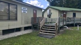 The Suwannee County School District temporarily moved its headquarters to mobile units (pictured) on Walker Avenue Southwest in Live Oak after mold forced employees out of the original building. The district expects to make a decision on its headquarters' future on or before the school board's Sept. 26 meeting. (Julianna Musumeci/WUFT News)