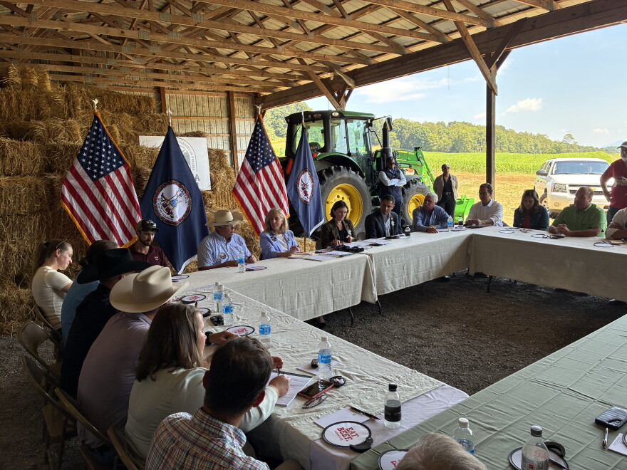 Virginia Gov. Abigail Spanberger (center left) and Katie Frazier, secretary of agriculture and forestry, meet with members of Virginia's cattle industry. 