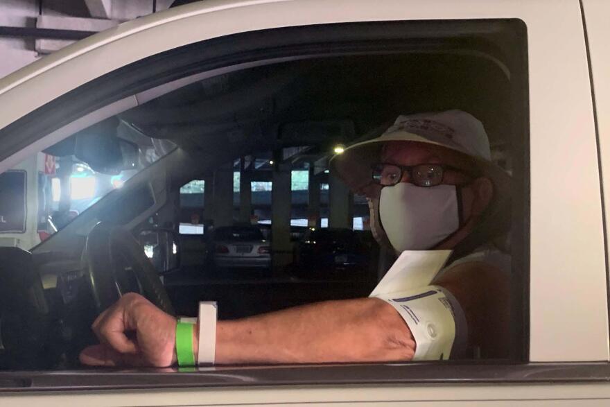 Veteran David Tootle pulls into the Tampa VA parking garage to be seen for back pain.