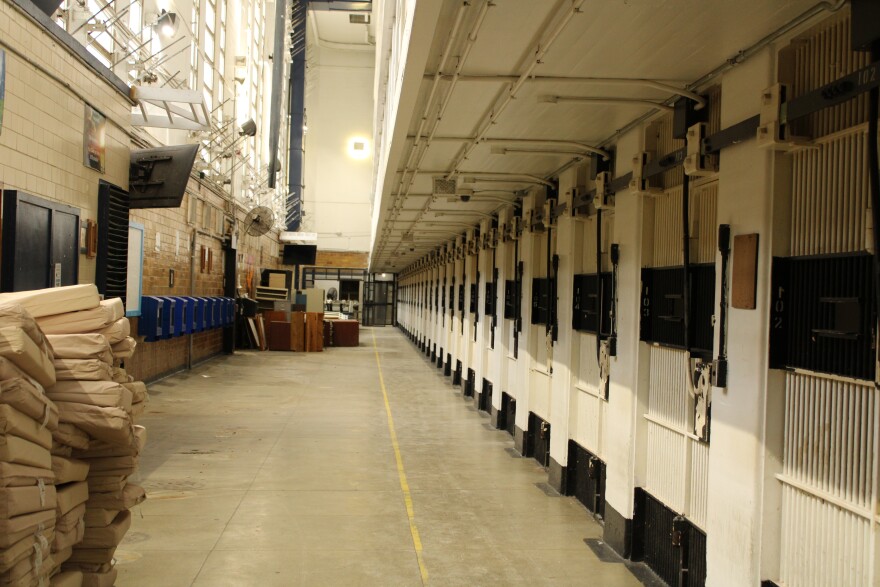 The bottom floor of Rockview's D Building, which has five tiers of cells. There are piles of mattresses on the left side of the floor, which will eventually be sent to other state prisons. 
