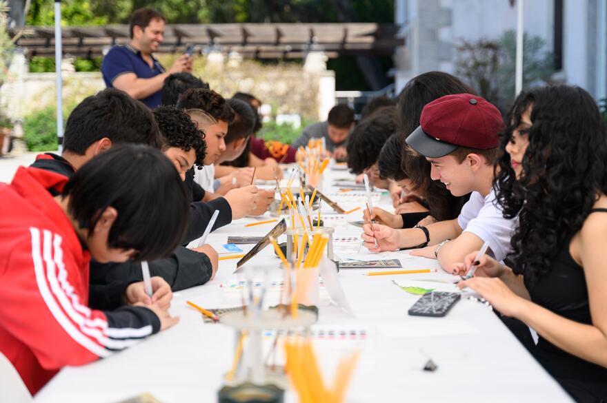 Miami-Dade County high school students work on pieces of art at the Vizcaya Museum & Gardens during the Creative Vizcaya art education program.