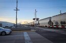 A freight train crosses 12th Street in Ogden, Dec. 18, 2025