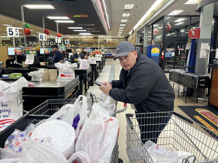 Ruben Urdaneta prepares grocery orders for delivery at Compare Foods in Durham on November 19, 2025.