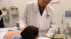 Dr. Lynn Webster, a pain specialist, treats a patient at Lifetree Clinical Research and Pain Clinic in Salt Lake City.