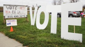 Organizers erected signs to draw attention to a one-day voting station at a Latino grocery in Des Moines, Iowa. Satellite voting locations are designed to make early voting more convenient.