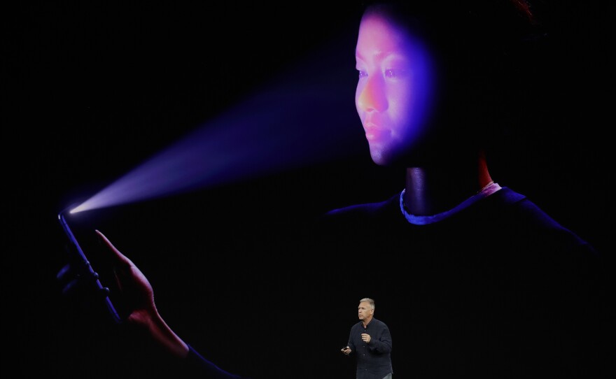Apple's Schiller presents the iPhone's new facial-recognition feature, called Face ID.