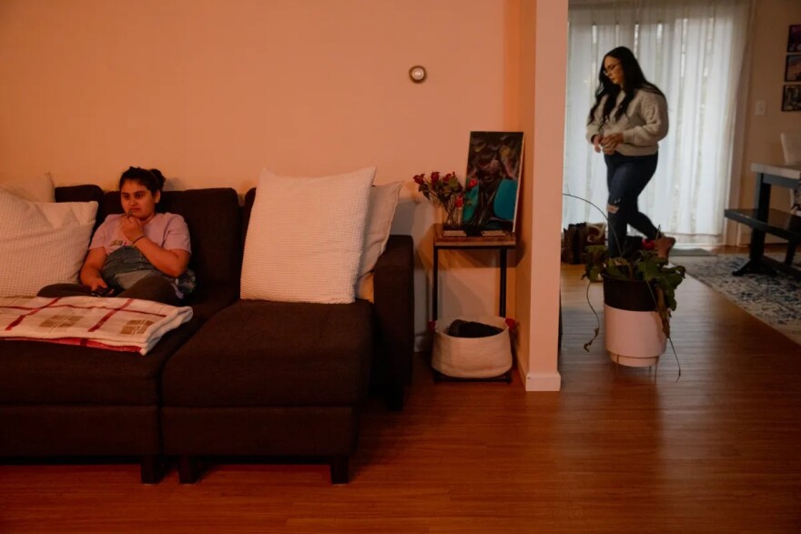 Kennedy, right, gets ready to leave to school while nuggets and pizza for dinner. “I don’t sleep,” Kennedy said, laughing. “I function off of four hours of sleep.”