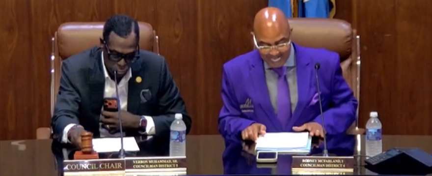 2 men at a Monroe City Council meeting