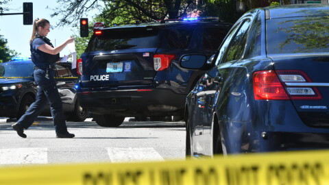 Kansas City Police investigate the scene of a homicide at 11th and Washington on April 29, 2024.