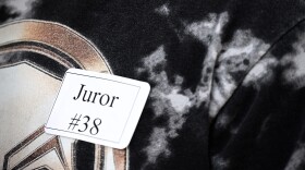 A potential juror leaves the federal courthouse after a mistrial in the Prairieland ICE shooting trial in Fort Worth.