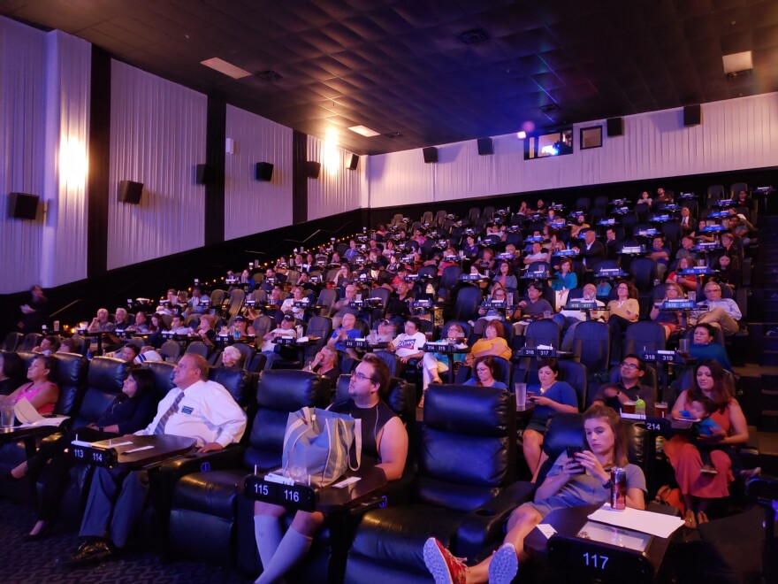 Texas Democrats watch Beto O'Rourke participate in the July presidential primary debate.