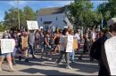 Protestors march through downtown Kenosha following the shooting of Jacob Blake Jr. by a Kenosha police officer