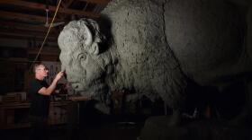 Wildlife artist Gary Staab prepares the bull bison sculpture in his studio.