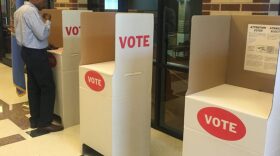 Rodney Redus of Oklahoma City votes at the Oklahoma School of Science and Mathematics polling location in Tuesday's primary. Only 47 voters had cast their ballots at the site as of 2:30 p.m.