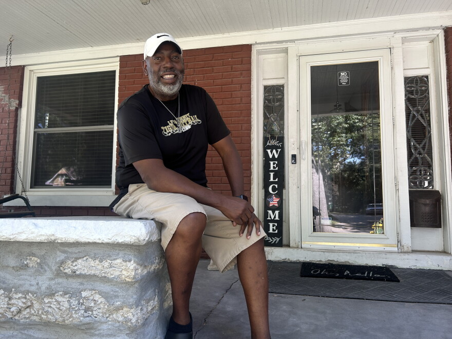 Anthony Wilson sits on his front porch on a Monday afternoon in late August after finishing his work shift.