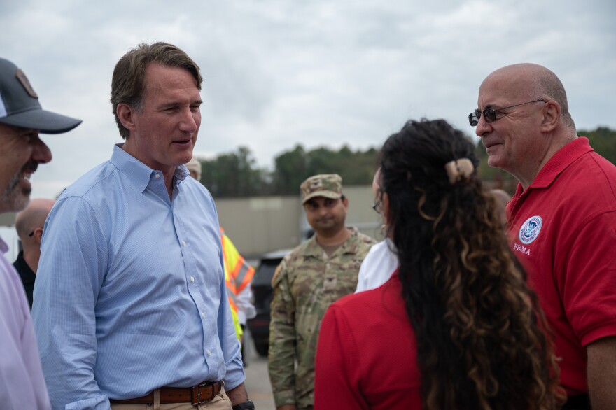 FEMA leadership and Virginia Gov. Glenn Youngkin discuss recovery in Damascus, Virginia in October 2024 following Hurricane Helene.