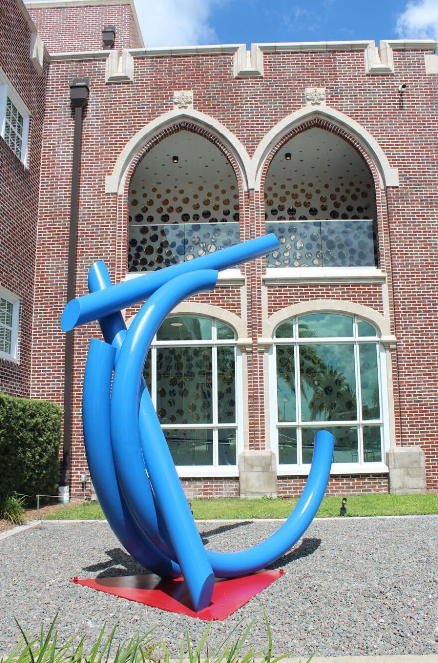 John Clement's 'Shazam' with Molly Hatch's 'Amalgam' seen through the ground floor windows and second floor loggia of the Sarasota Art Museum.