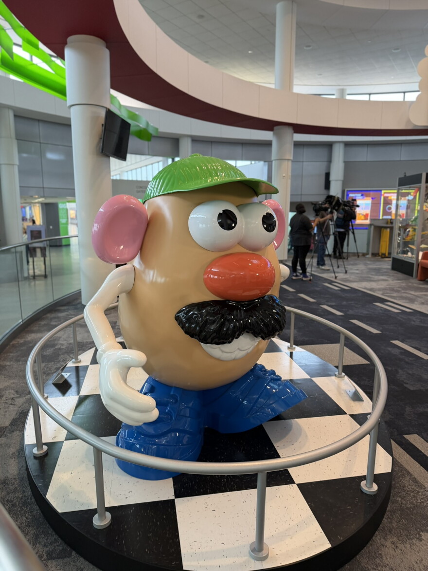 The newly expanded play zone in Concourse A of the Frederick Douglass Greater Rochester International Airport includes a photo-ready, larger-than-life statue of Mr. Potato Head.