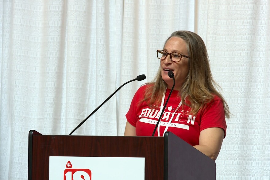 Jenny Noble-Kuchera, president of the Monroe County Education Association, spoke to the crowd at the Statehouse during the Indiana State Teachers Association's Day of Action on April 14.
