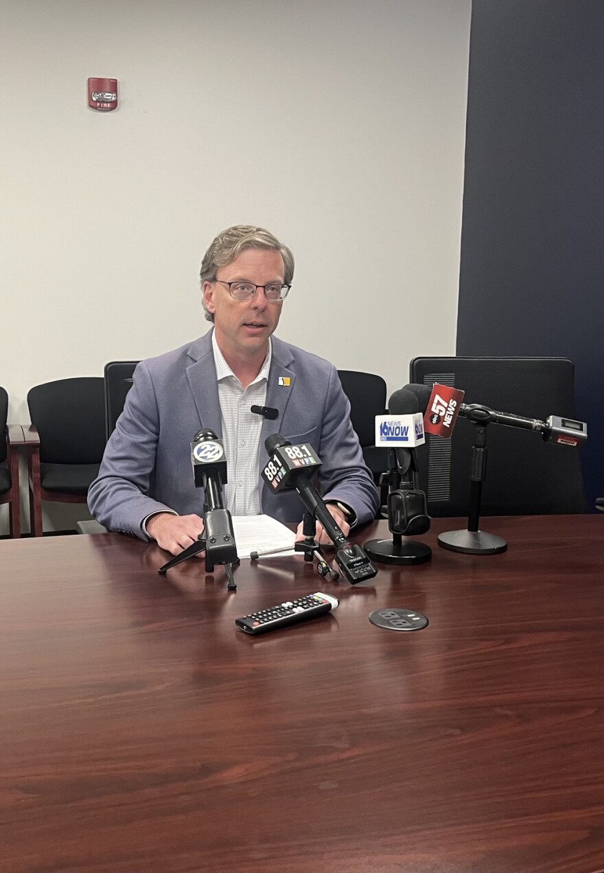 South Bend Mayor James Mueller talks with reporters on Wednesday, Sept. 16, 2026 about his executive order banning city staff from signing non-disclosure agreements about data centers. The move came a week after two South Bend Common Council members learned Mueller's public works director and city engineer had signed NDA's with Amazon.