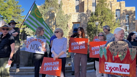 Penny Seguin (center) was among those gathered outside of the Boulder County Courthouse while the Supreme Court heard oral arguments in Washington, D.C.