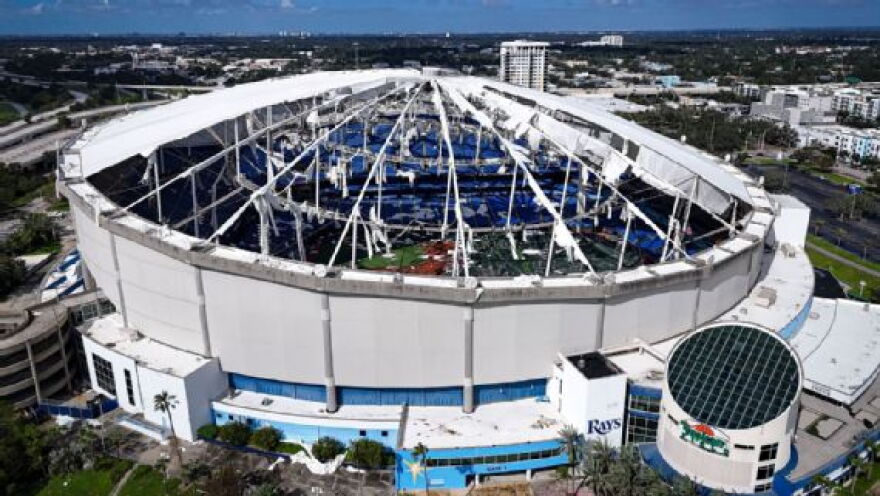 Most of the fabric covering the domed roof at Tropicana Field was torn off Wednesday night as Hurricane Milton made landfall along Florida's Gulf Coast.