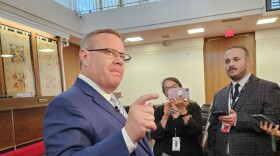 House Speaker Tim Moore, left, speaks to reporters about the legislature's budget plan on Tuesday, Sept. 19.