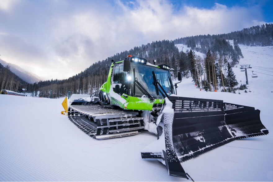A hybrid snow groomer at Taos Ski Valley uses renewable diesel made from feedstocks such as vegetable oil and animal fats.