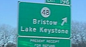 A sign marks the Bristow exit on the Turner Turnpkike.