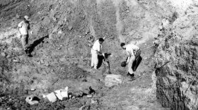 Investigators uncover the remains of civil rights volunteers Michael Schwerner, Andrew Goodman and James Chaney under thick red clay of an earthen dam near Philadelphia, Mississippi in July of 1964. The volunteers, all in their 20s, died at the hands of the Ku Klux Klan while working to register black voters during the Freedom Summer civil rights campaign.
