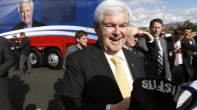 Newt Gingrich greets supporters during a campaign appearance at a restaurant in Reno, Nev., on Wednesday. He said Thursday he will challenge Florida's winner-take-all scheme for awarding delegates. 