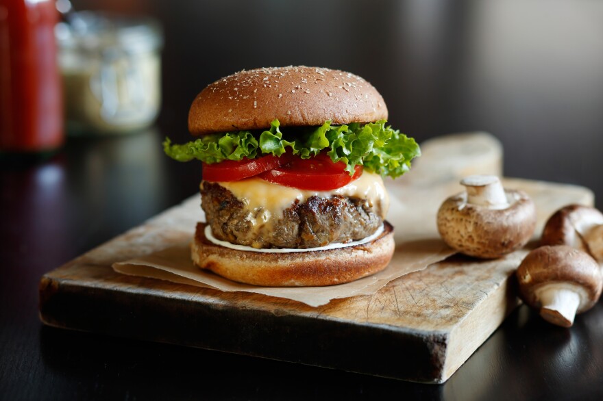 The idea behind the blended beef-mushroom burger is that mixing chopped mushrooms into our burgers boosts the umami taste, adds more moisture and reduces the amount of beef needed. And reducing the need for beef has a big impact on the environment.